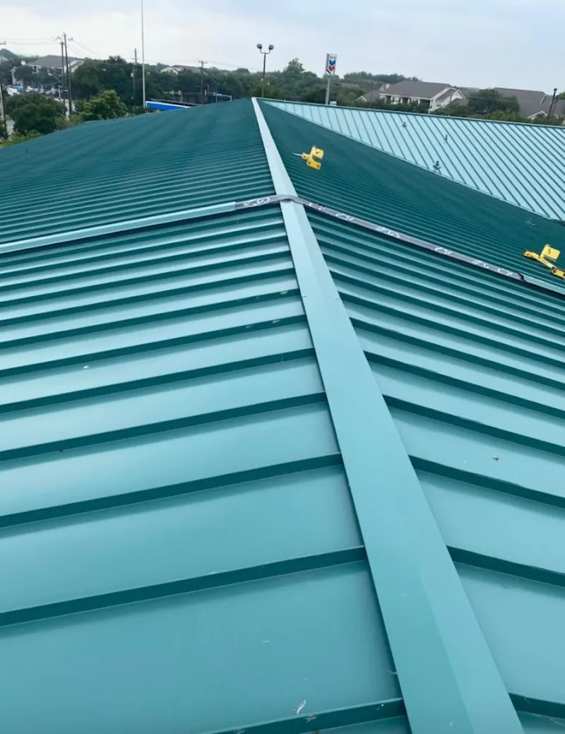 Green commercial metal roof ridge and valley for Metal Roof Repair in Thomas